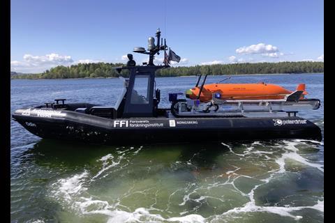 The system can be deployed by any craft capable of supporting its weight and that of the AUV